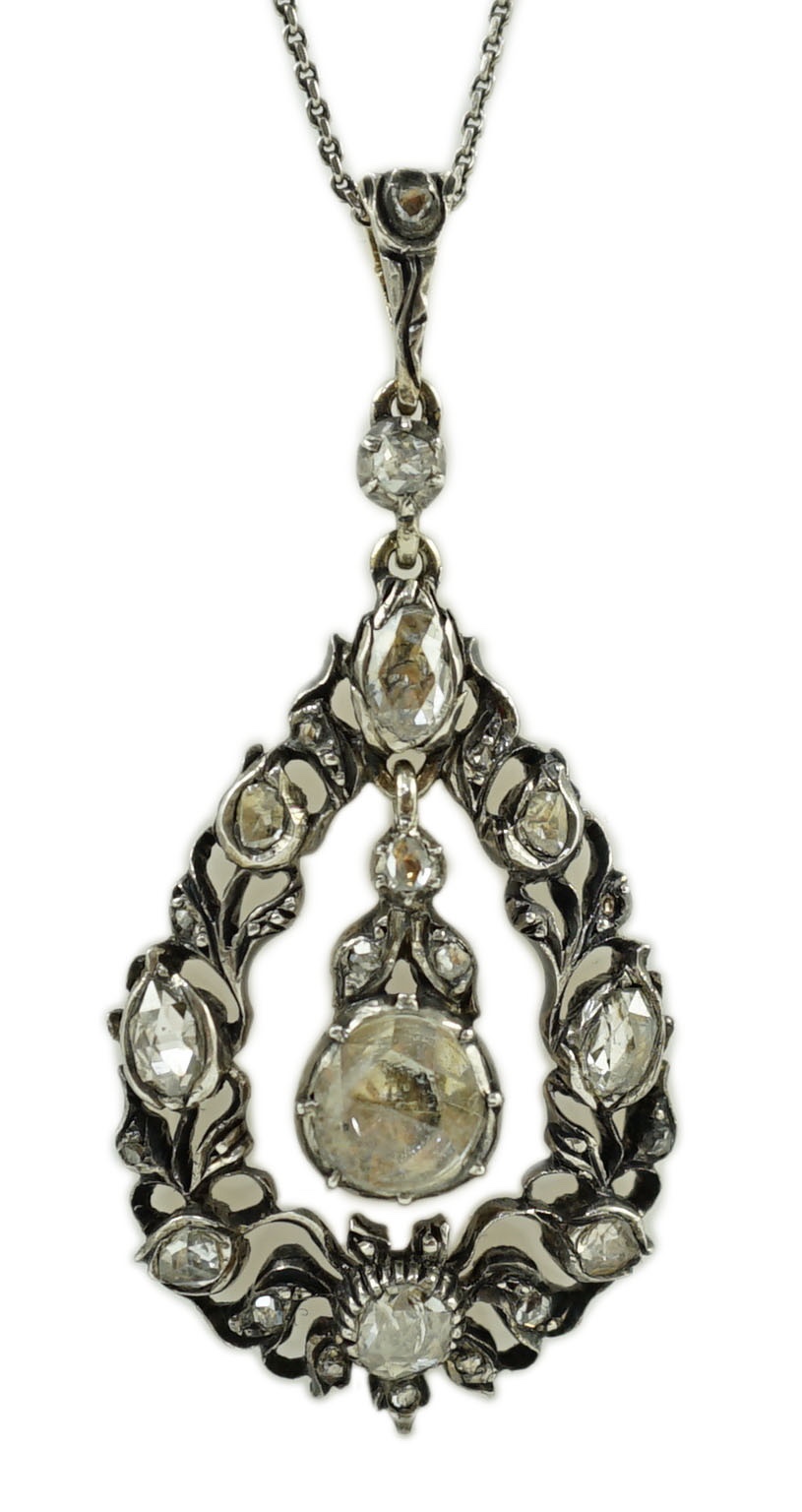 A 19th century continental gold, silver and old cut diamond set pear shaped drop pendant, on a later? fine link chain